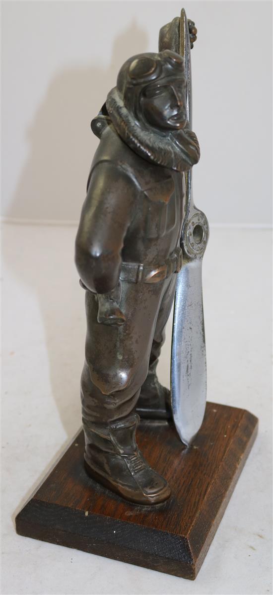 An Art Deco bronzed and chrome plated spelter aviator figural lighter, 10.75in.